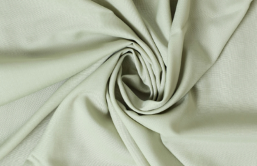 Fabric Shrinkage Linen fabric shot by Shoaib Sheikh from Unsplash
