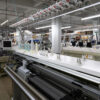 textile production image from https://fashinnovation.nyc/services/